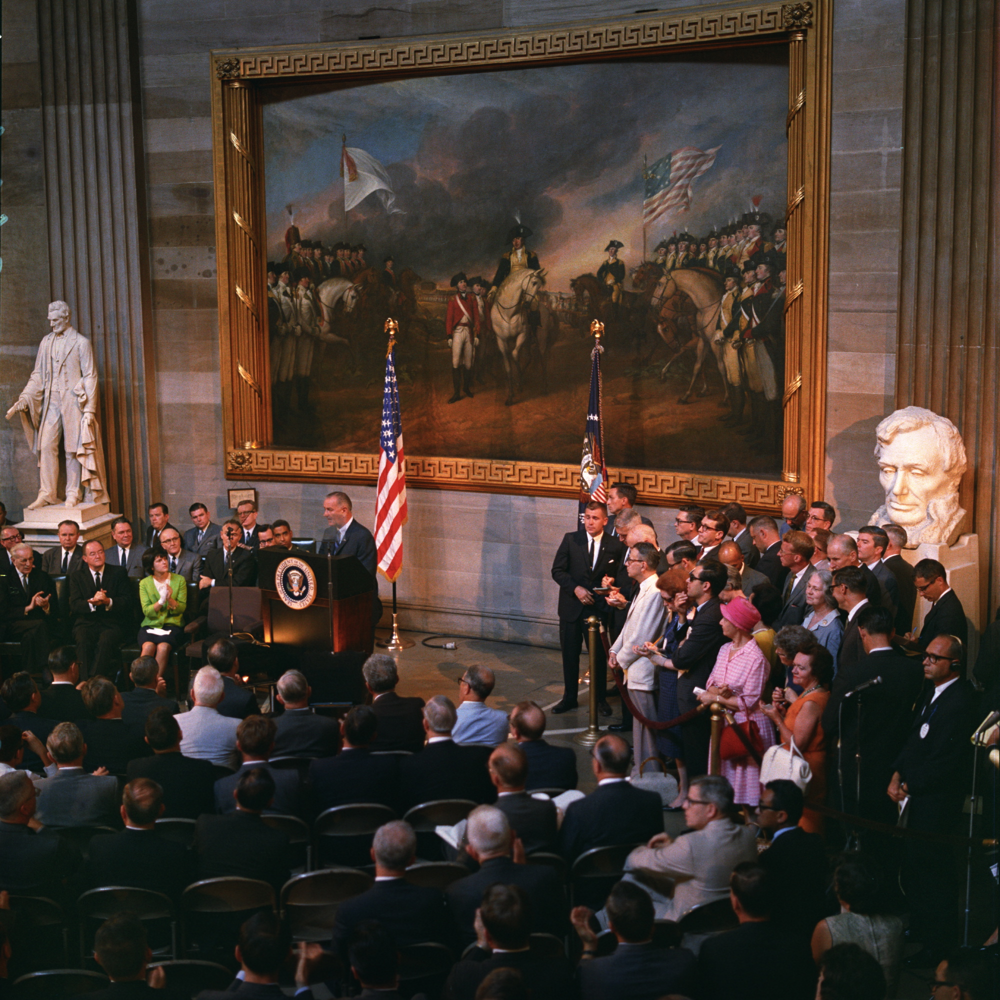 President Lyndon B. Johnson gives remarks inside the U.S. Capitol rotunda before signing the Voting Rights Act.