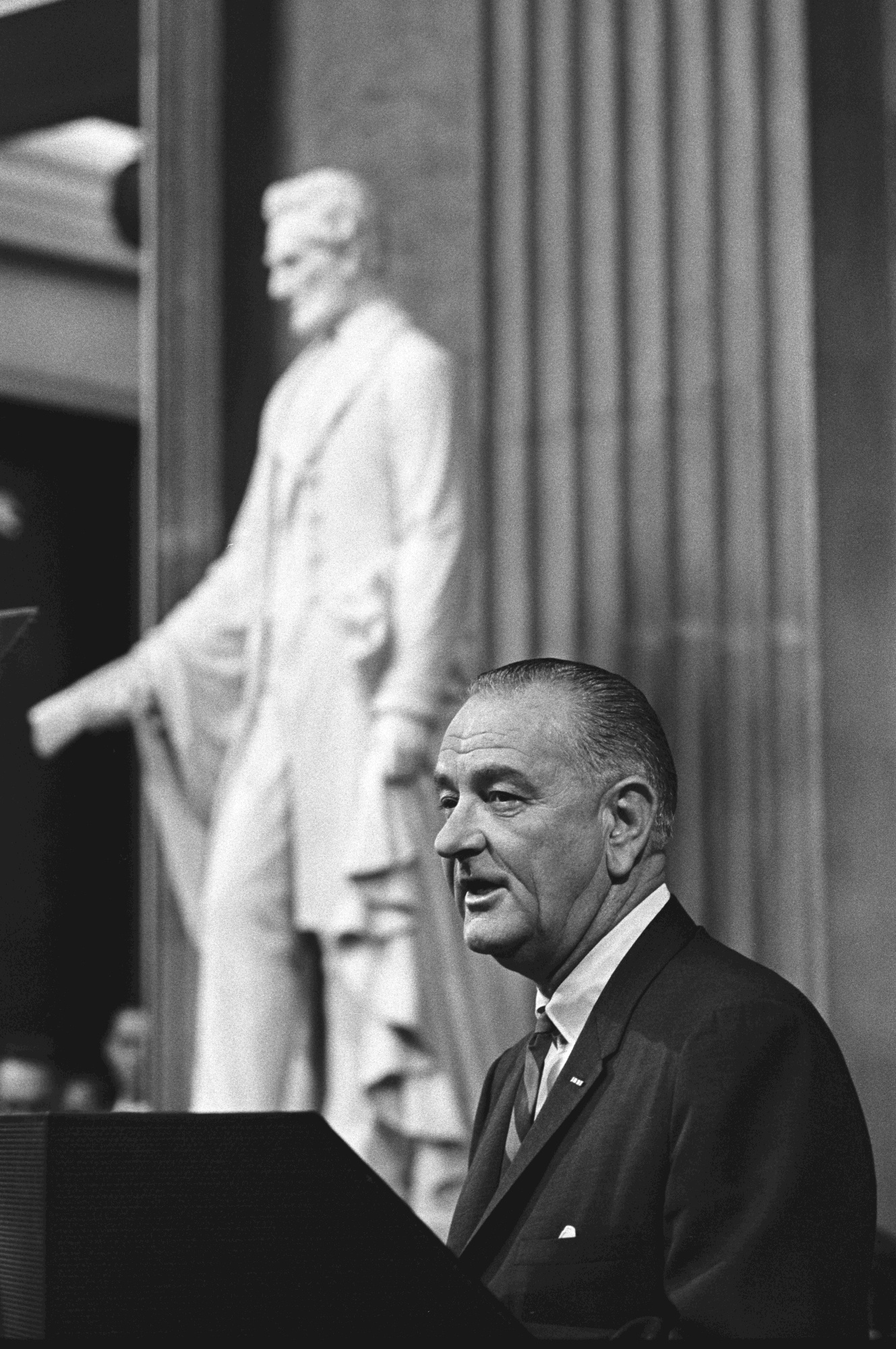 President Lyndon B. Johnson gives remarks inside the U.S. Capitol rotunda before signing the Voting Rights Act.