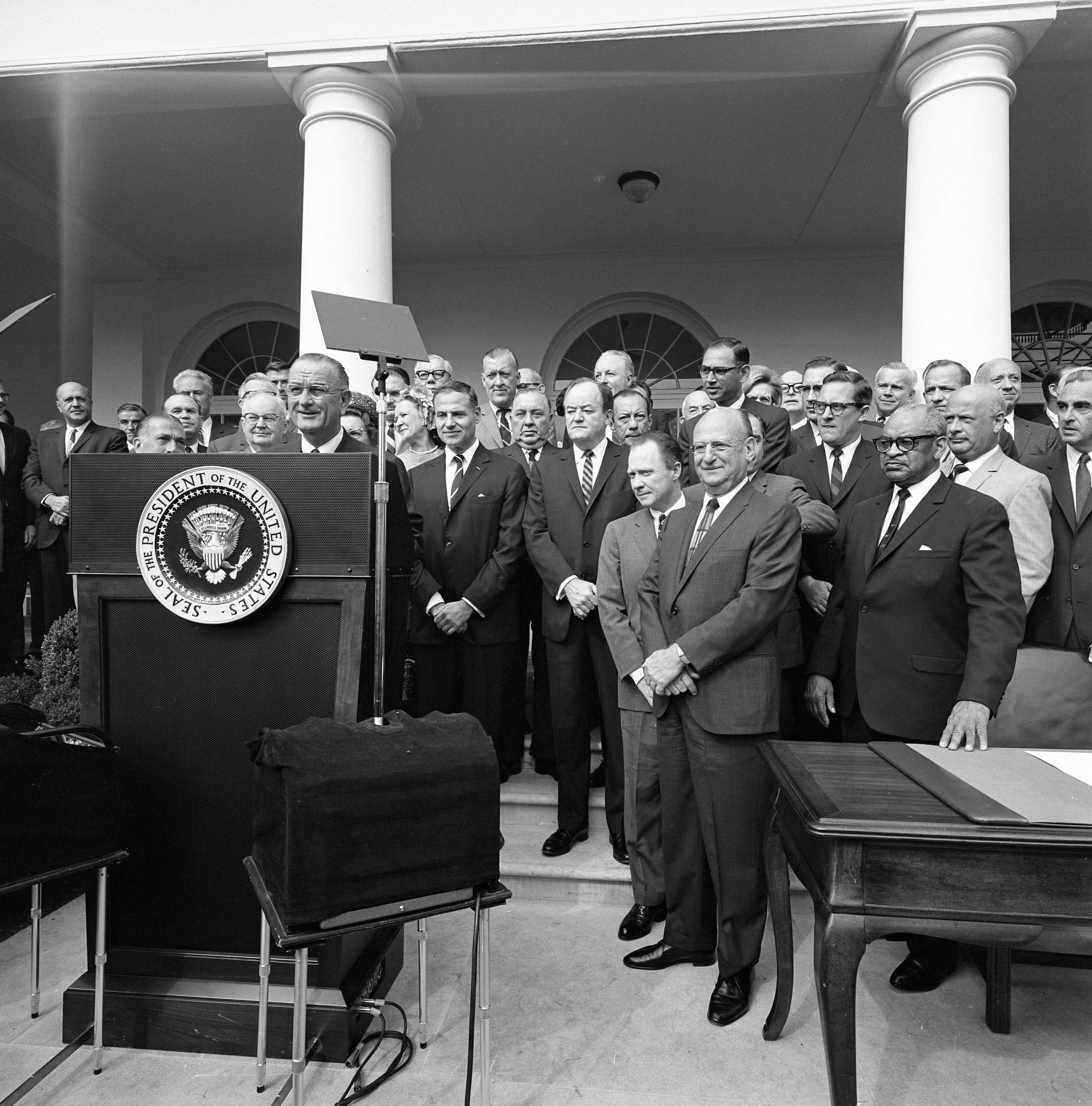 President Lyndon B. Johnson delivers remarks at the signing of the Department of Housing and Urban Development (HUD) bill.