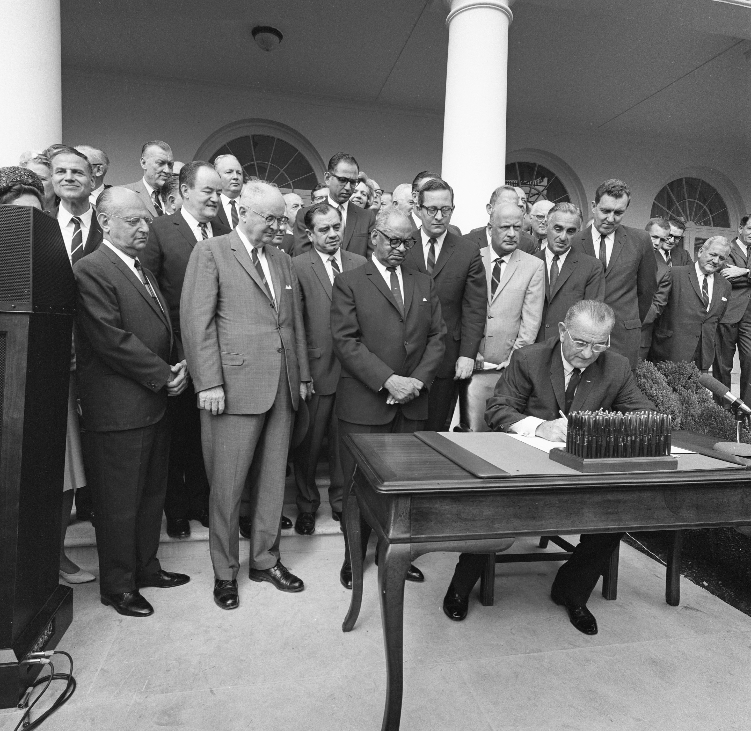 President Lyndon B. Johnson signs bill establishing a Department of Housing and Urban Development (HUD).