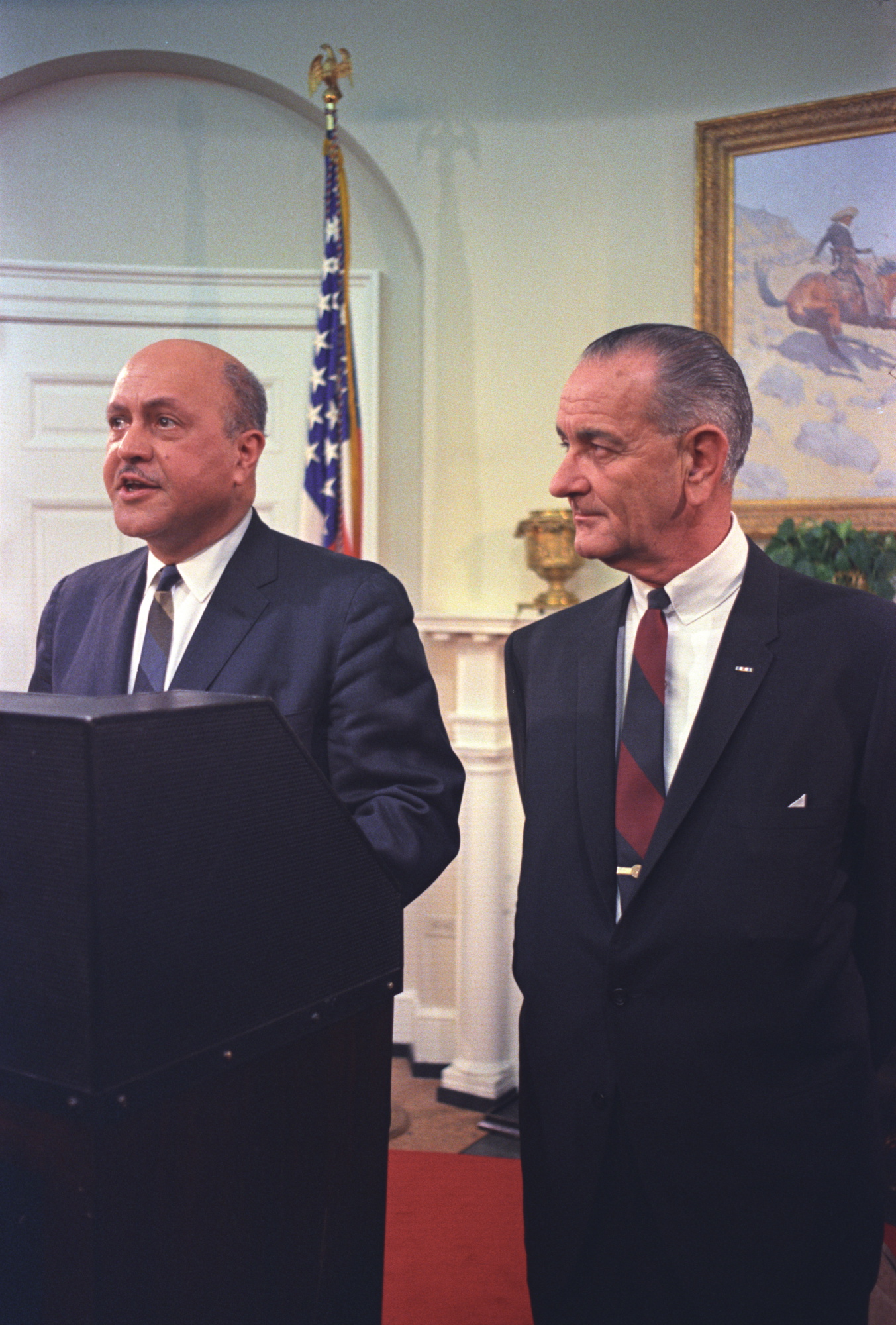 Robert C. Weaver and President Johnson at press conference announcing Weaver's appointment as the first secretary of HUD.