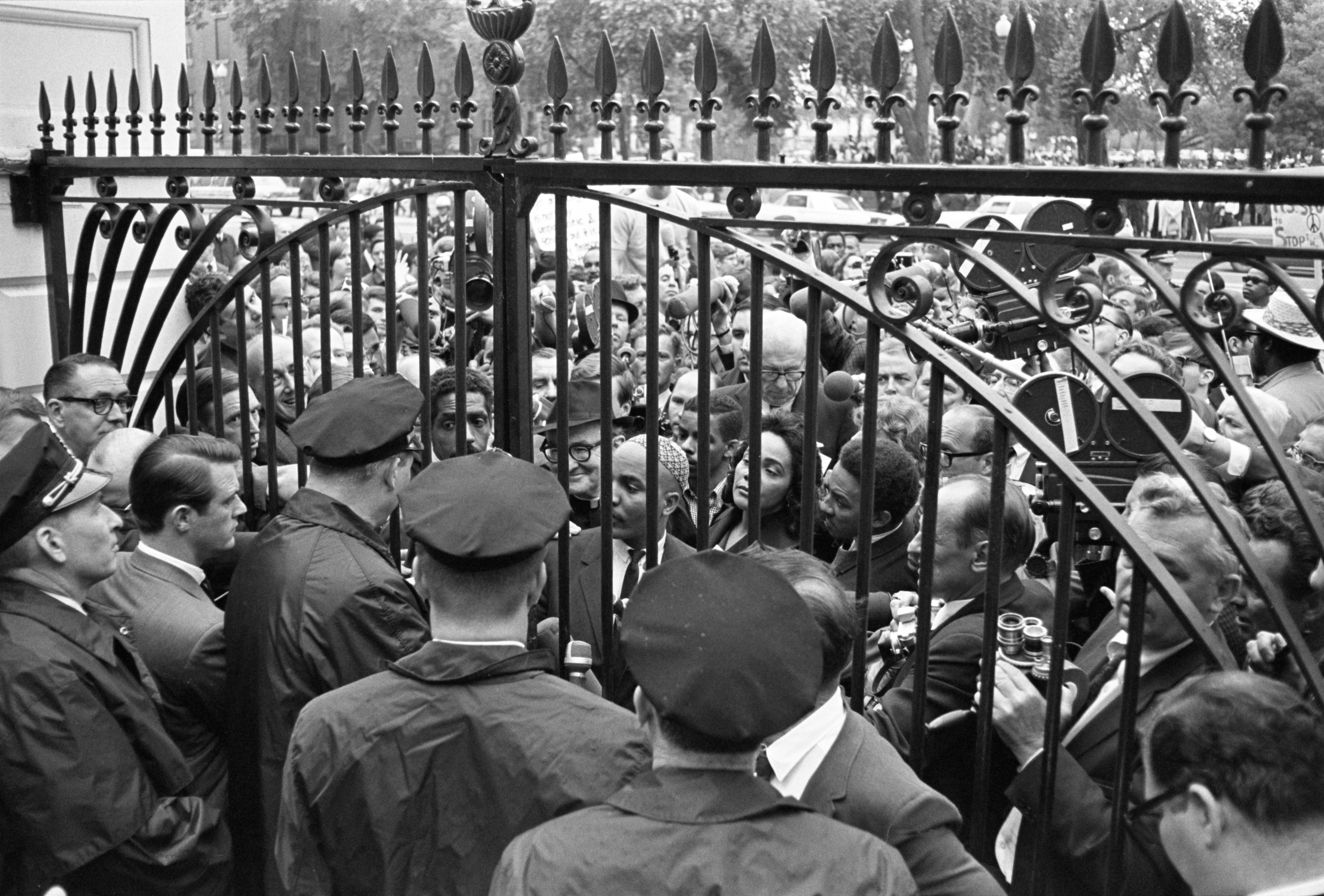 Vietnam War Protestors outside White House gates, including Coretta Scott King and Dr. Benjamin Spock. LBJ Library photo by Robert Knudsen #5390-8A.