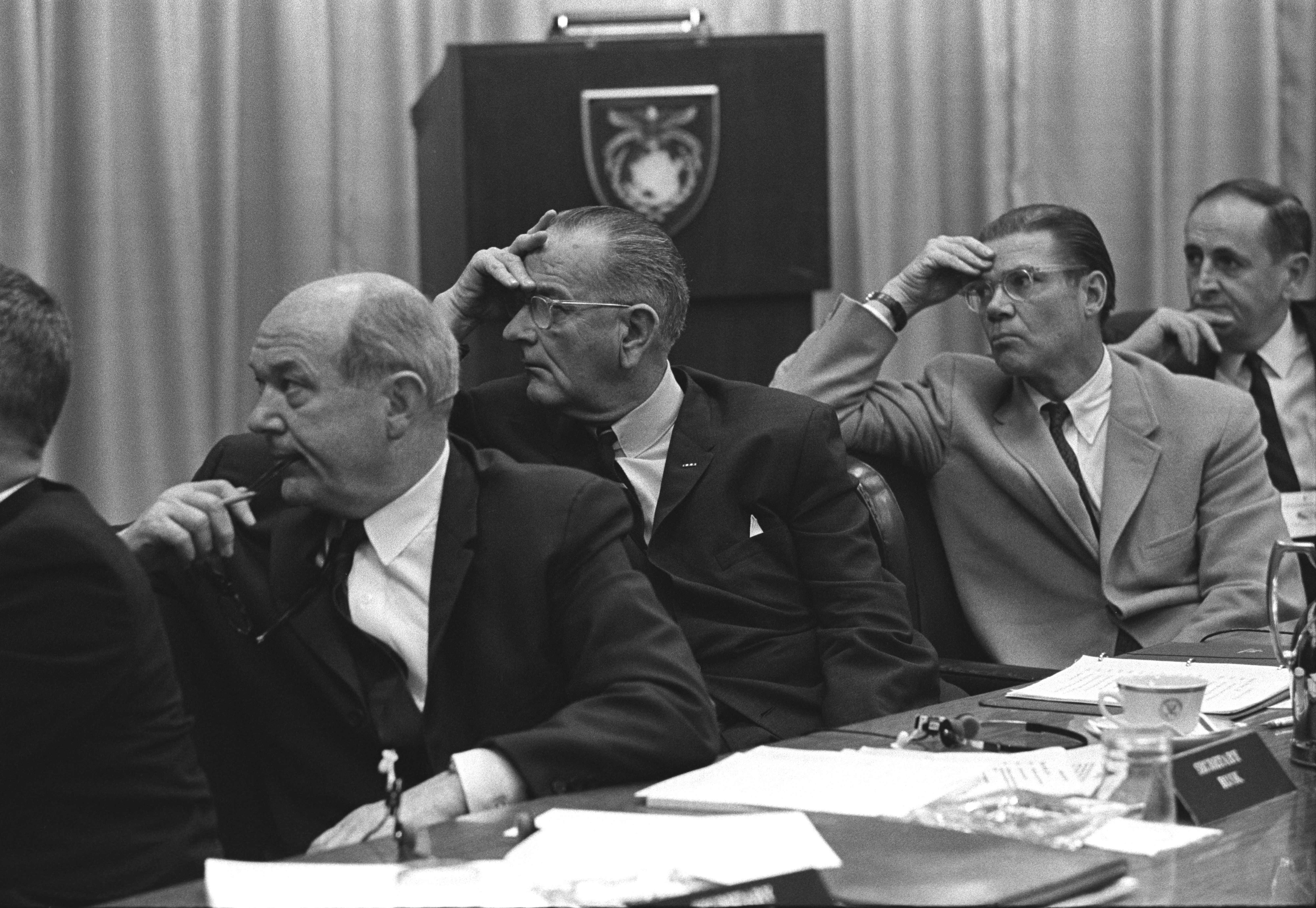 (L-R:) Sec. Orville Freeman (partially seen), Sec. Dean Rusk, President Lyndon B. Johnson, Sec. Robert McNamara, Sec. John Gardner. LBJ Library photo by Yoichi Okamoto #A1889-11.