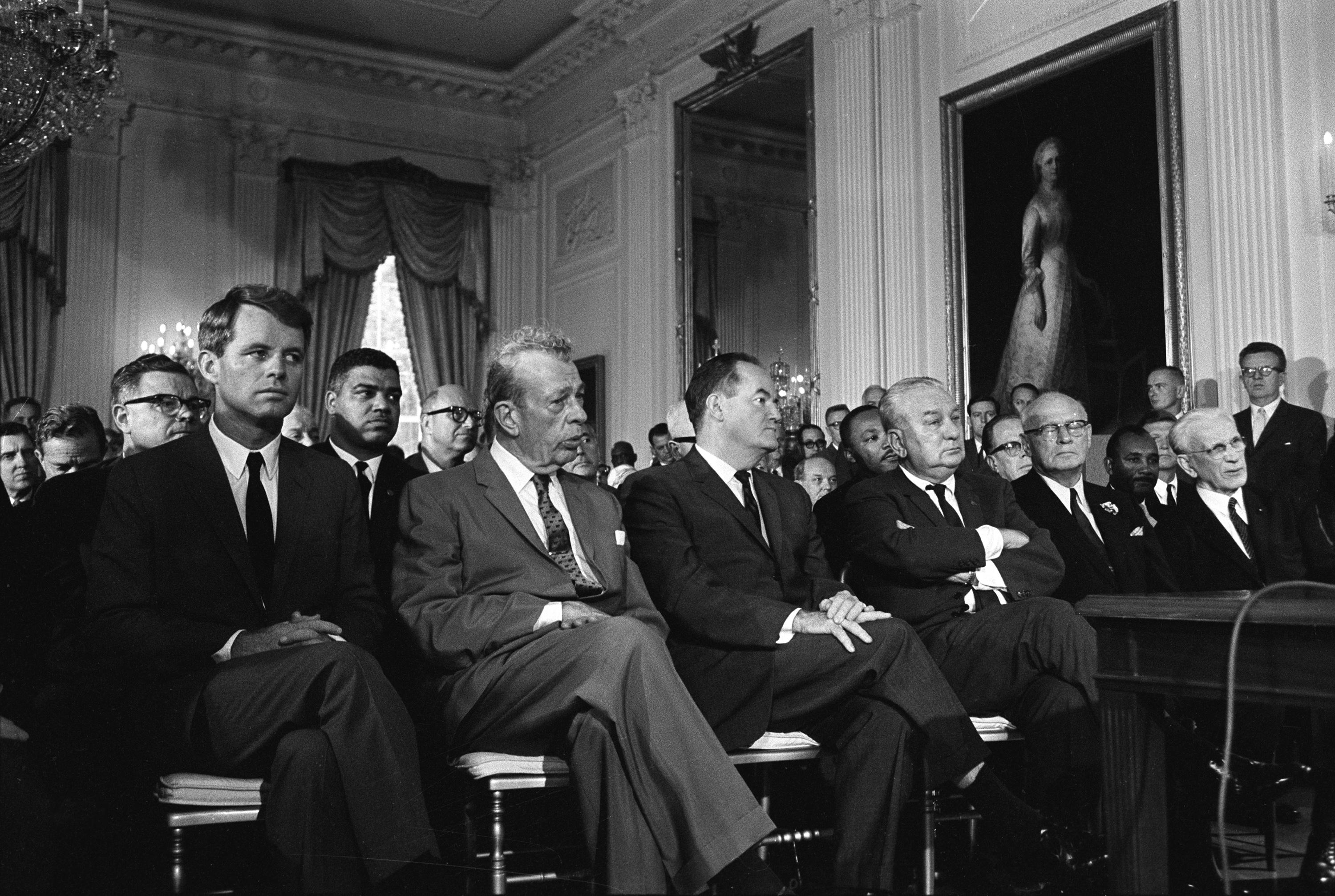 Signing of the Civil Rights Act of 1964. LBJ Library photo by Cecil Stoughton #276-2-WH64.
