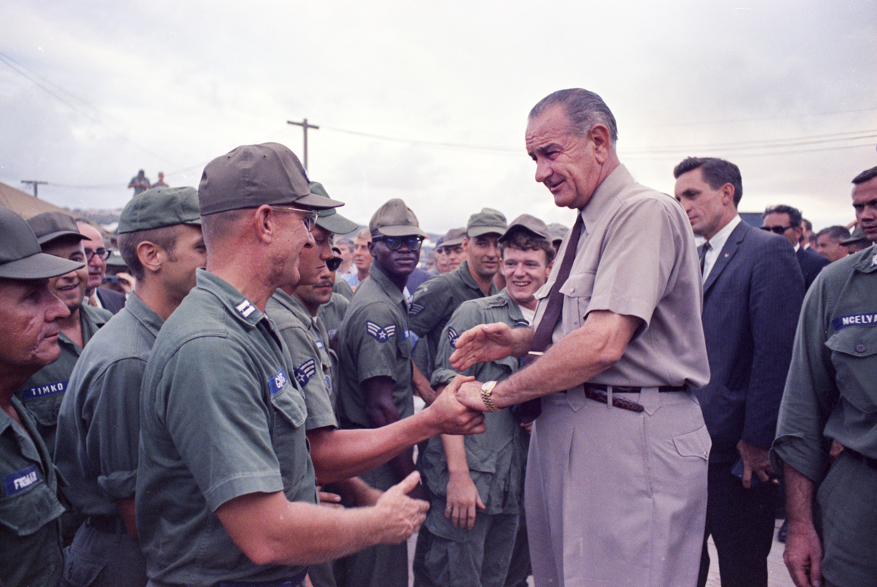 President Johnson visits U.S. soldiers at Cam Ranh Bay in South Vietnam. LBJ Library photo by Yoichi Okamoto #C3601-5a.