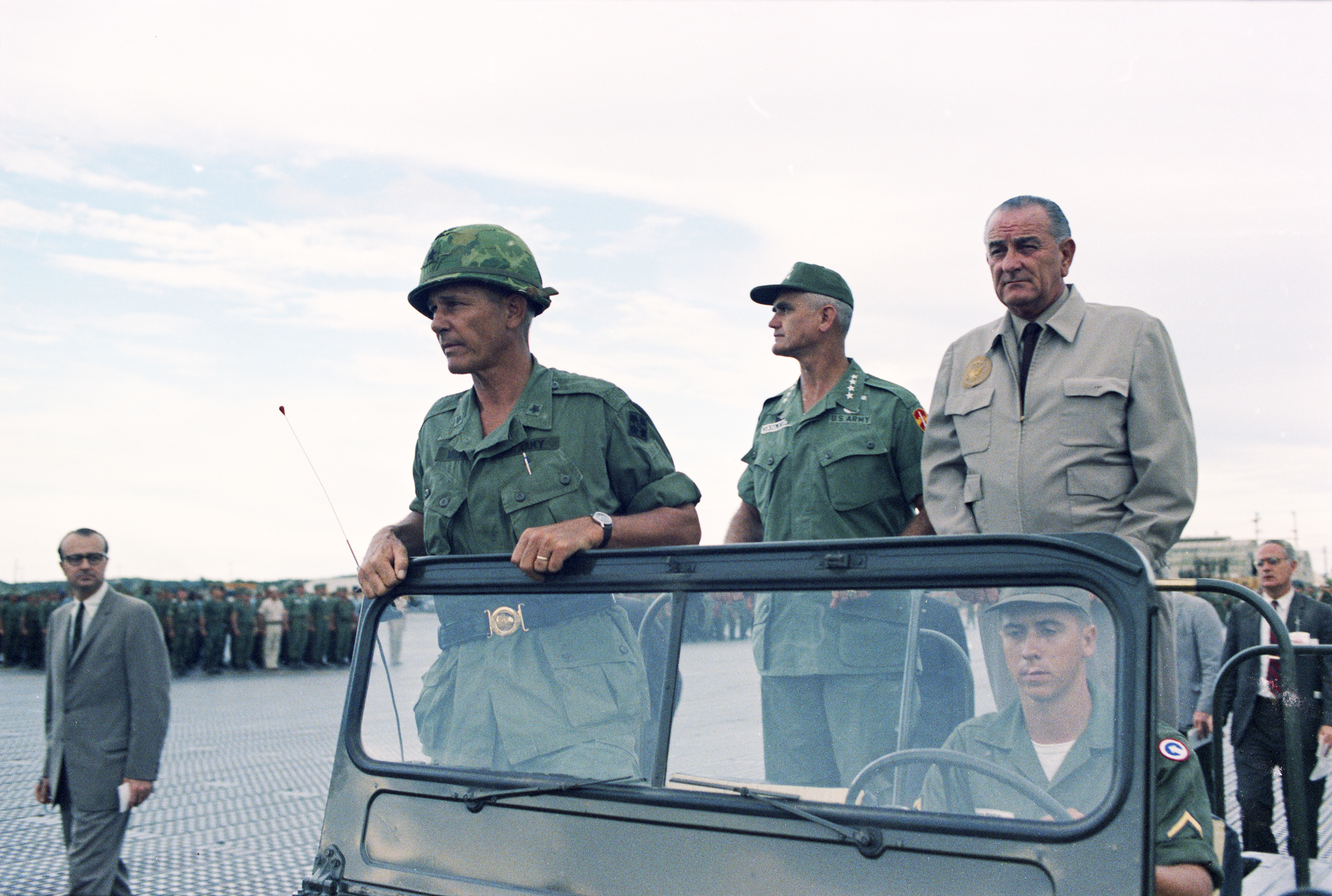 Gen. William Westmoreland (left) and President Johnson in a jeep at Cam Ranh Bay. LBJ Library photo by Yoichi Okamoto #C3602-11.