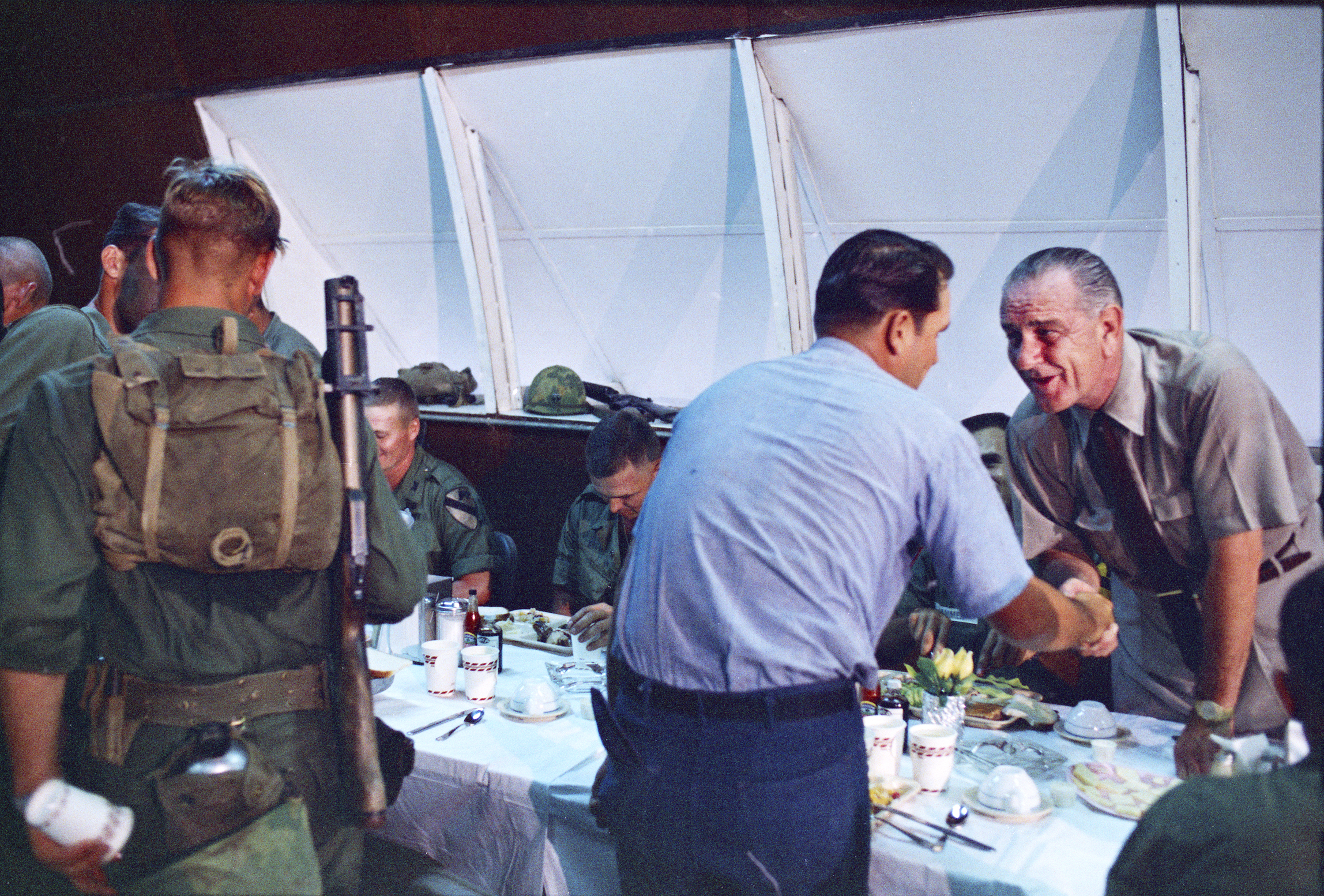 President Johnson visits U.S. Soldiers at Cam Ranh Bay in South Vietnam. LBJ Library photo by Yoichi Okamoto #C3604-8a.