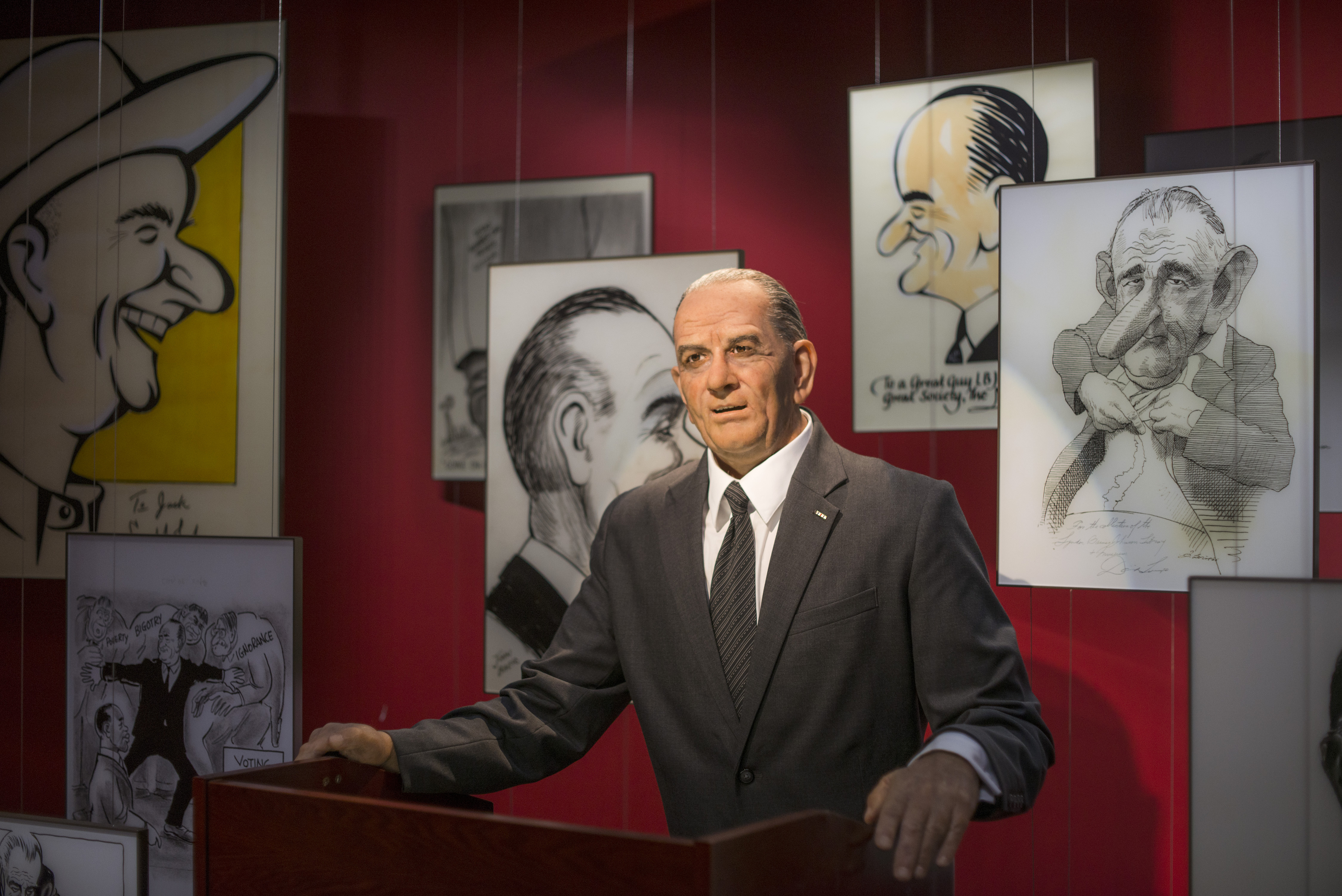 A moving, life-sized animatronic LBJ tells humorous stories to visitors in the permanent Humor and the Presidency exhibit at the LBJ Presidential Library in Austin, Texas.