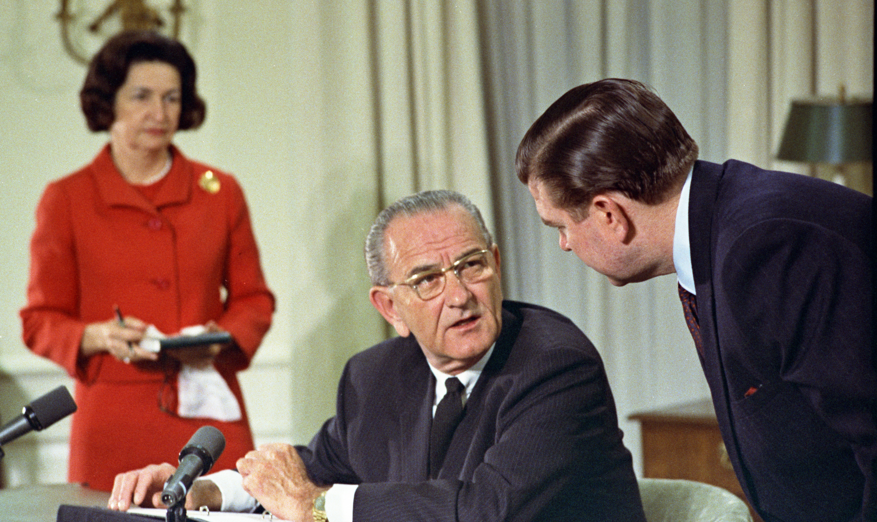 Lady Bird Johnson, President Johnson, Marvin Watson preparing for televised speech