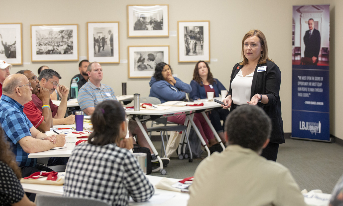 LBJ Library Education Specialist Mallory Lineberger guides the teachers through the material. LBJ Library photo by Jay Godwin, DIG14543-006
