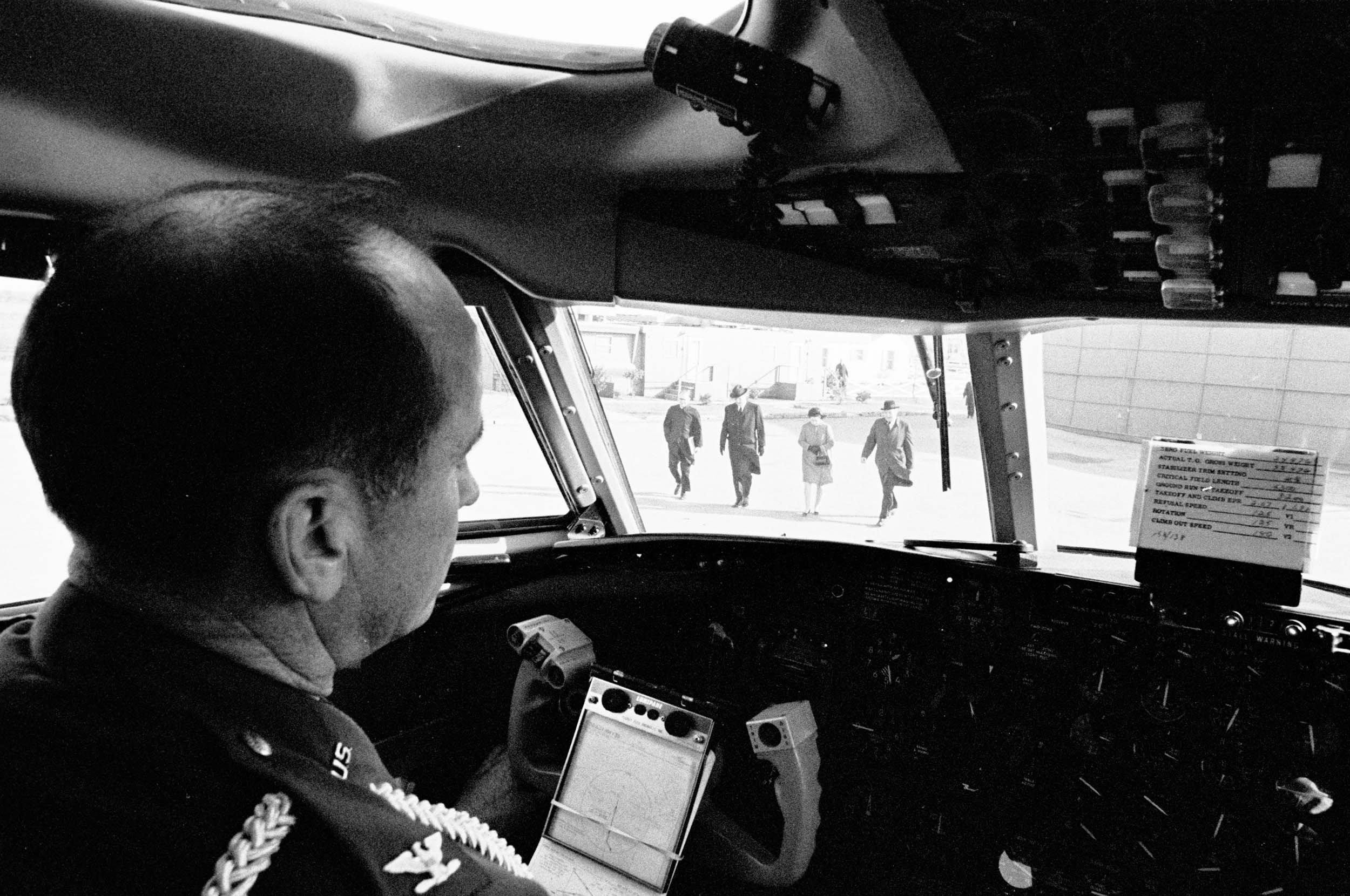 Col. James Cross in the cockpit awaiting departure from the LBJ Ranch.