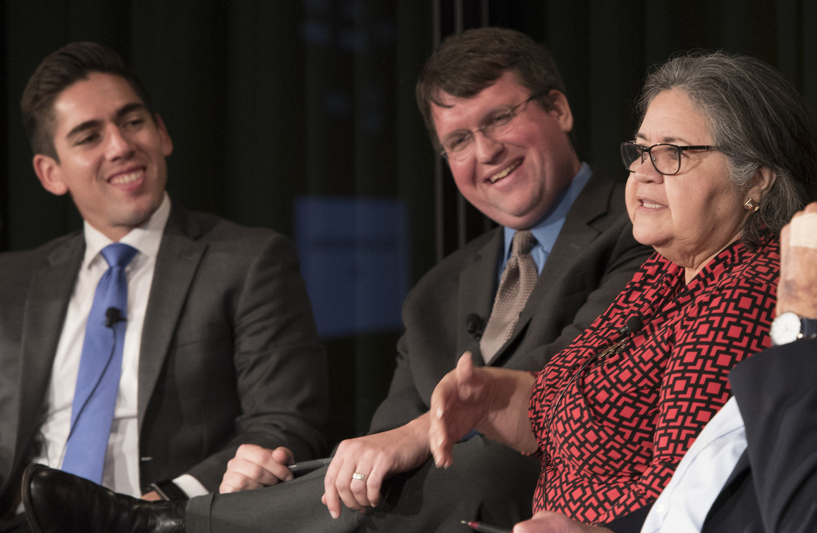 Ernest Herrera, Eric Opiela, and Norma Cantú on stage as panelists as part of the Future Forum's November 2017 event on gerrymandering and voter ID.