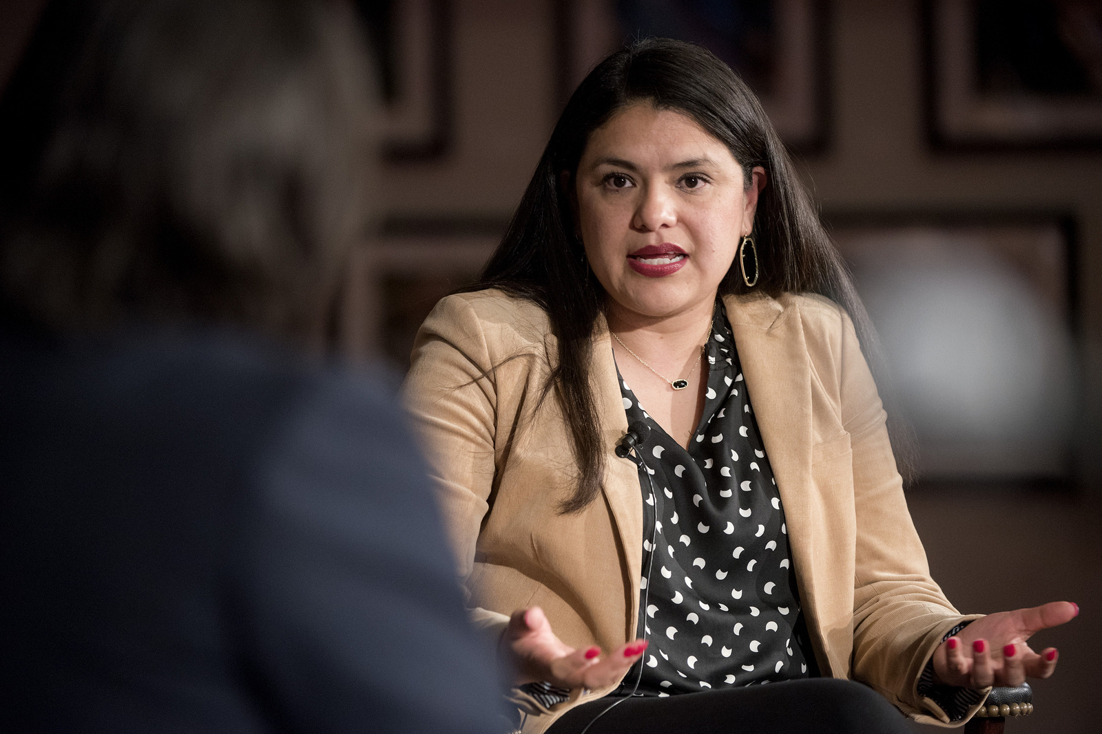 Closeup of Montserrat Garibay speaking during the LBJ Future Forum's sanctuary cities program.