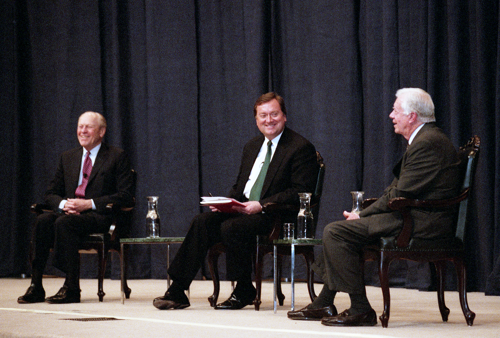 President Gerald Ford, NBC's Tim Russert, and President Jimmy Carter at the LBJ Presidential Library, April 13, 2000.