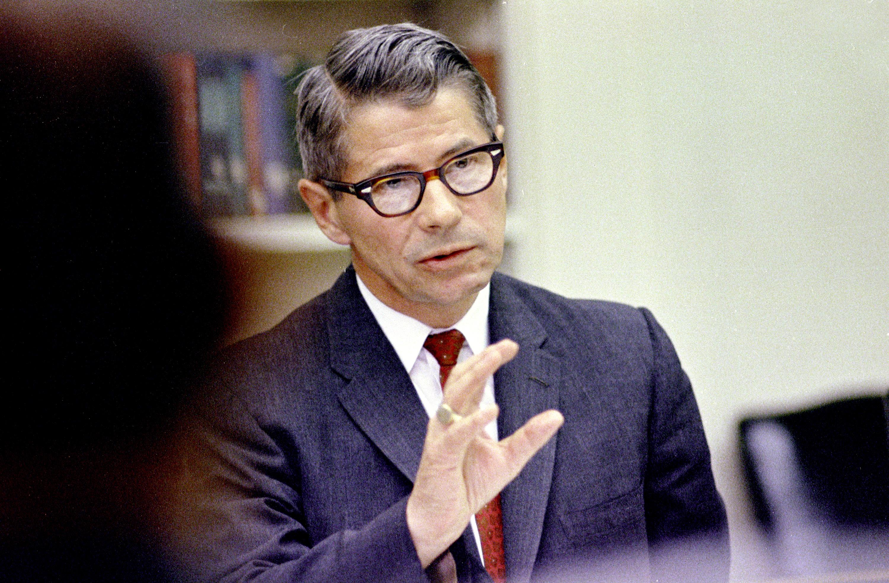 Tight shot of Orville L. Freeman speaking during a meeting