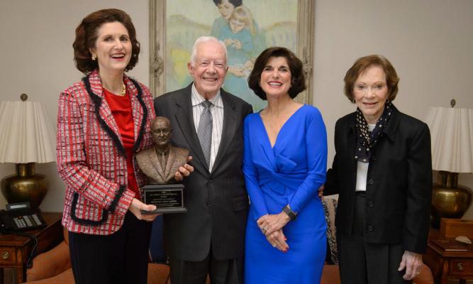 President Jimmy Carter accepts the LBJ Liberty & Justice For All Award at The Carter Center in Atlanta. L to R: Lynda Johnson Robb, Pres. Jimmy Carter, Luci Baines Johnson, Rosalynn Carter. Photo by Michael A. Schwarz/LBJ Library January 13, 2016. Atlanta, GA.