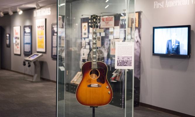 John Lennon's missing Gibson J-160E guitar. LBJ Library photo by Lauren Gerson #DIG13762-021.
