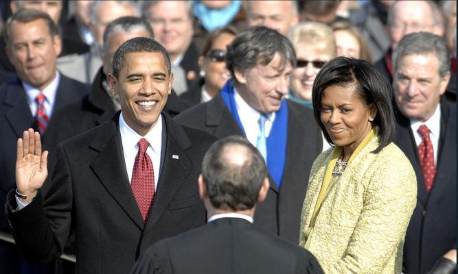 With his family by his side, Barack Obama is sworn in as the 44th president of the United States by Chief Justice of the United States John G. Roberts, Jr. in Washington, D.C., Jan. 20, 2009. More than 5,000 men and women in uniform are providing military ceremonial support to the presidential inauguration, a tradition dating back to George Washington's 1789 inauguration. Photo by Master Sgt. Cecilio Ricardo, U.S. Air Force.
