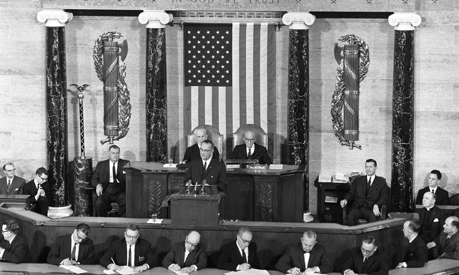 President Lyndon B. Johnson gives the State of the Union Address. LBJ Library photo by Cecil Stoughto #3-6-WH64 .