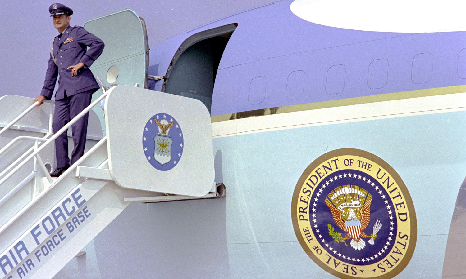 Col. James Cross poses outside Air Force One. 